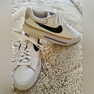Nike Women’s White Sneakers with Black Swoosh and Cream Trim